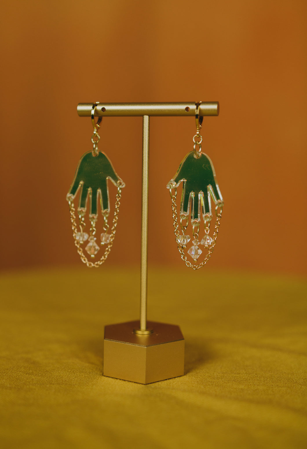 The Frida Holographic Hand Dangles